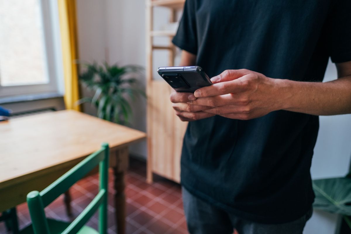 A man looking at his phone