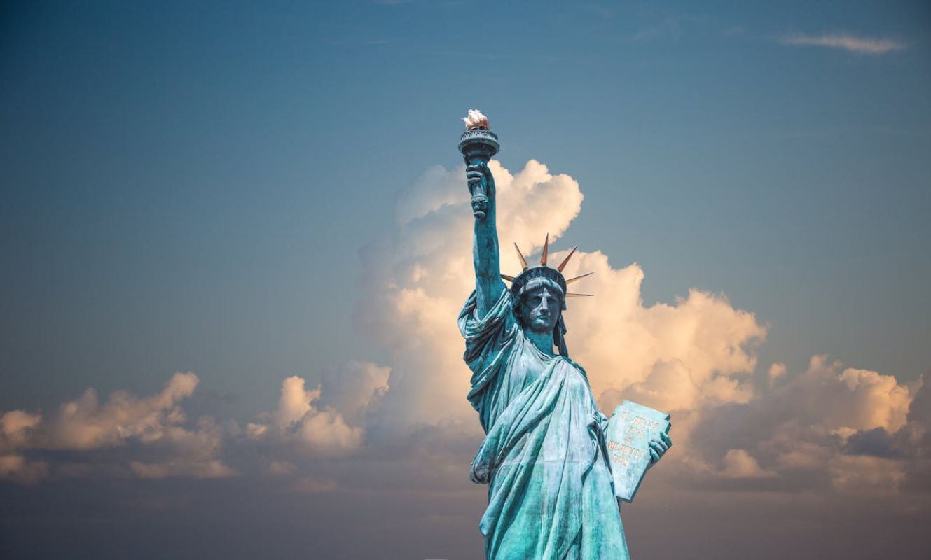 Statue of Liberty under a blue sky